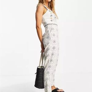 Never Fully Dressed embroidered jumpsuit in white starfish print